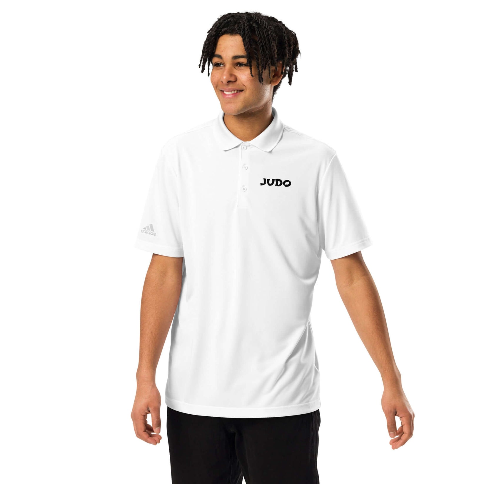 A man standing and wearing Adidas Judo Polo T-shirt front view showing minimalist JUDO text on a white polo