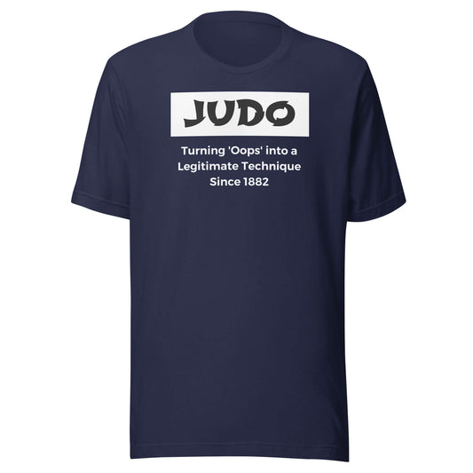 Judo humor t-shirt front view with 'Oops into Technique' design on navy t-shirt